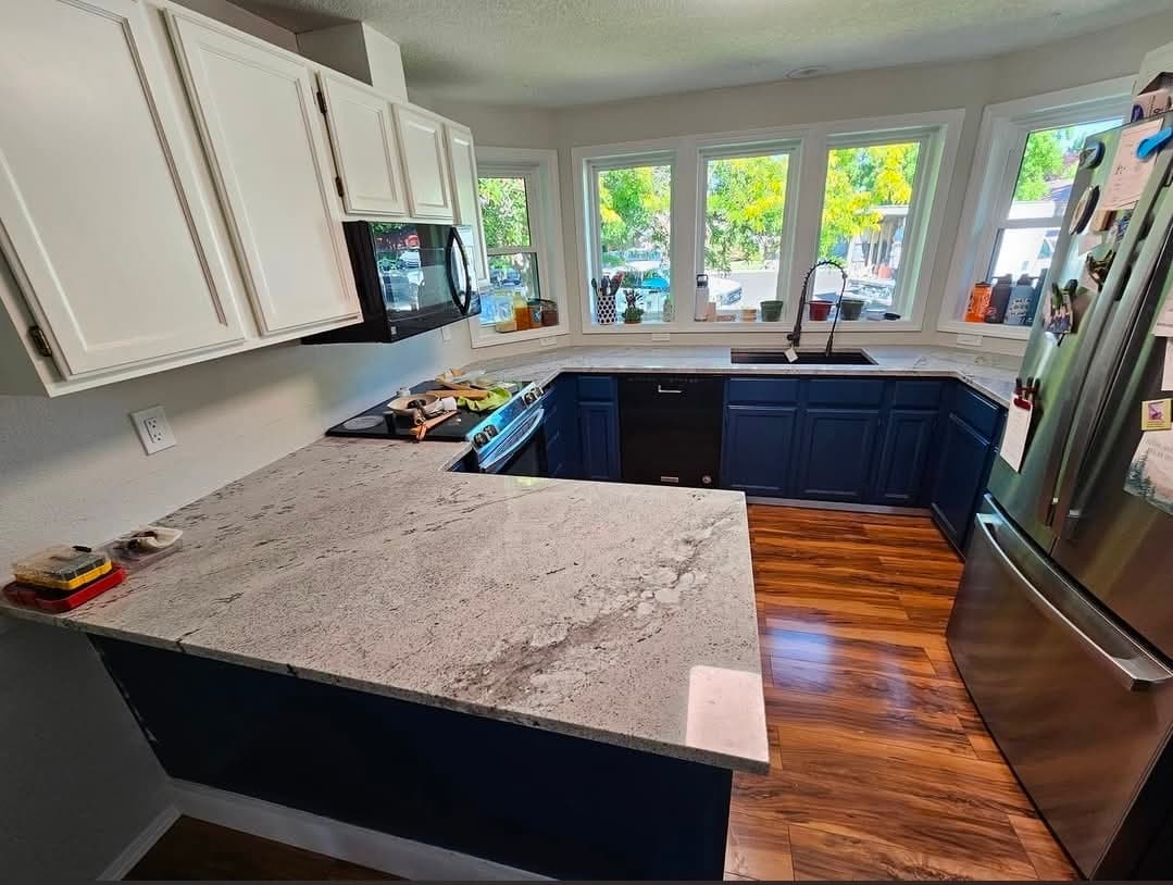 Blue cabinets with gray granite