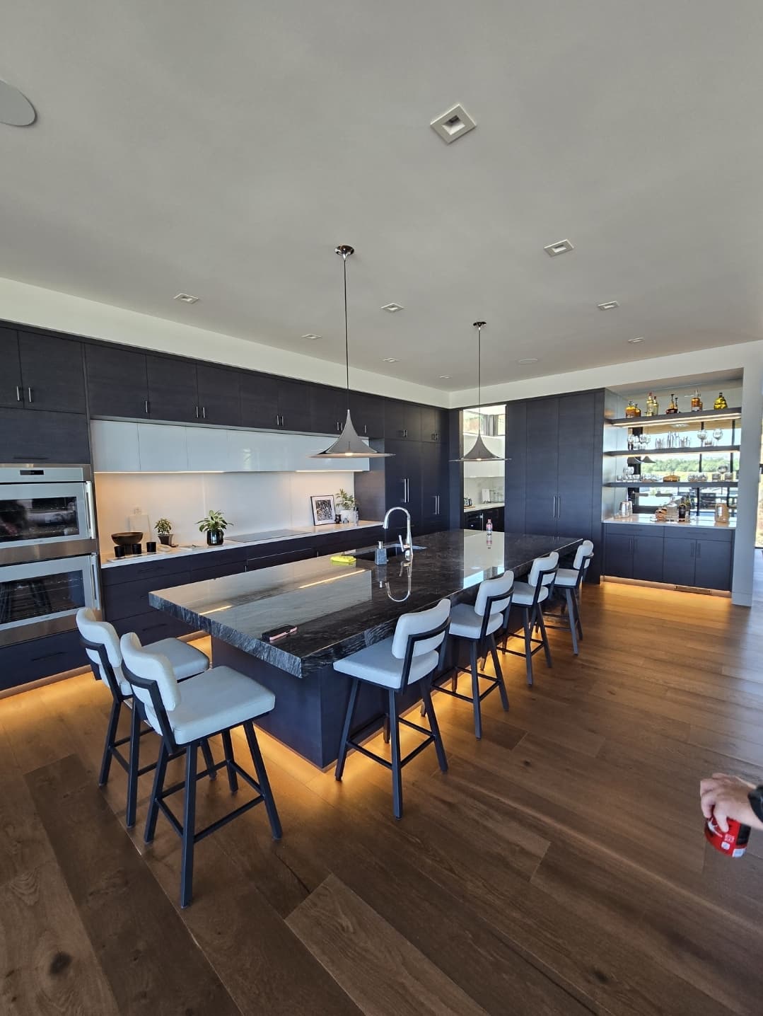 Dark navy kitchen with stone island