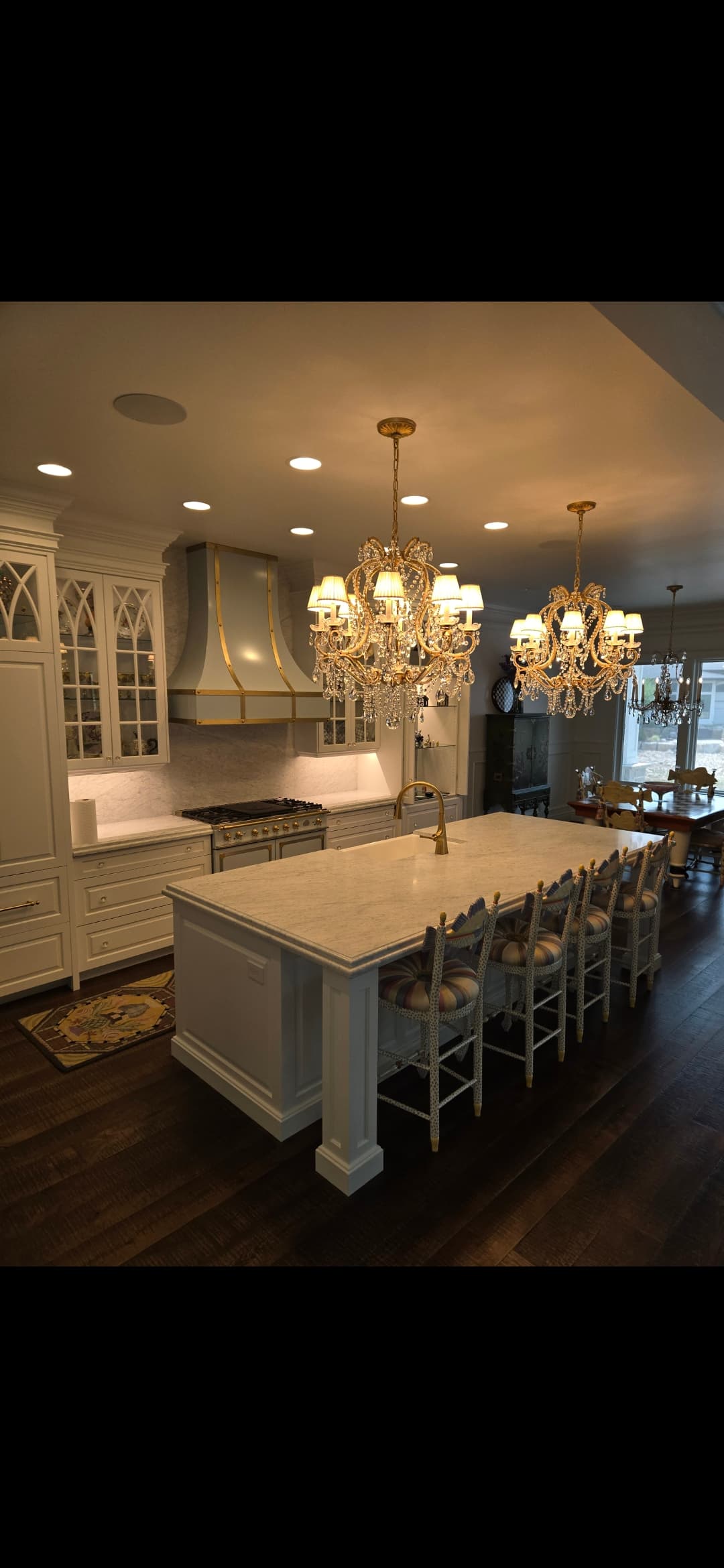 Formal white kitchen with marble island