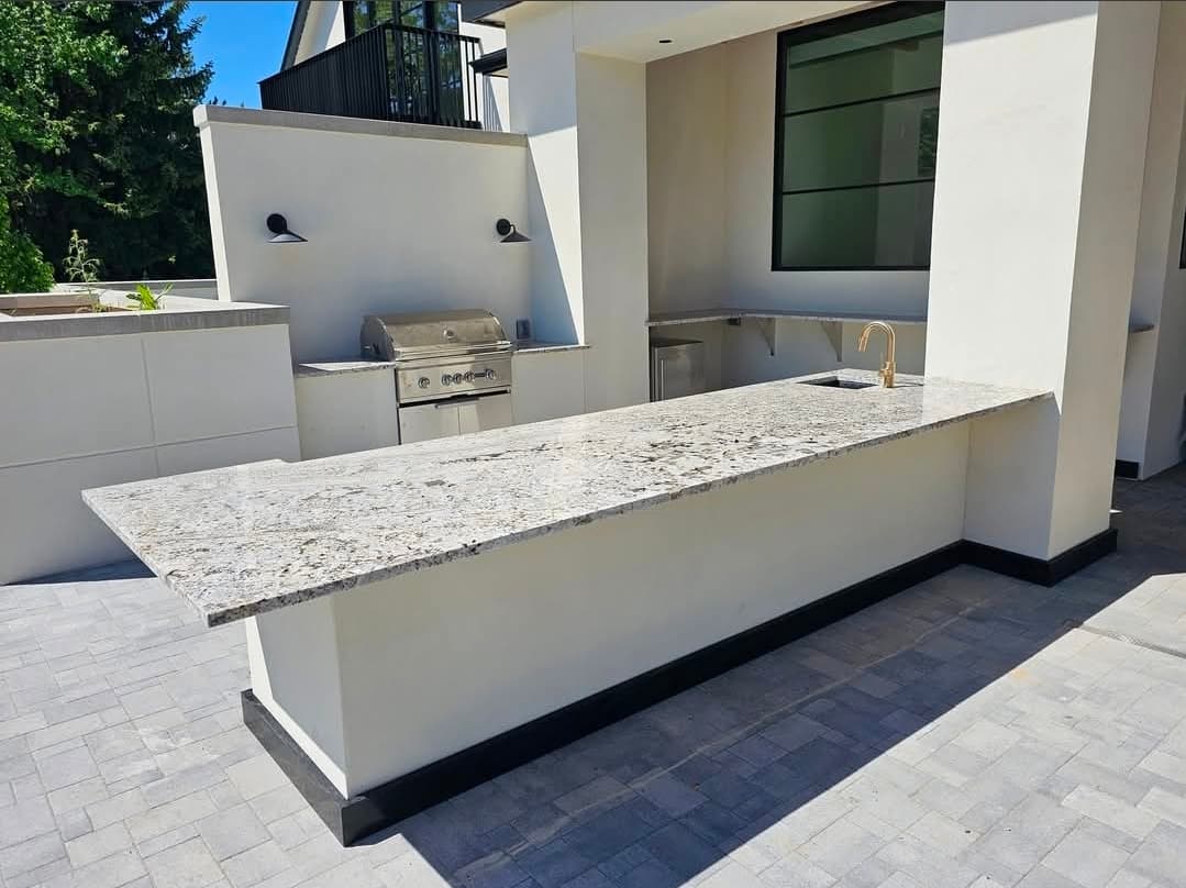 Outdoor kitchen with gray granite