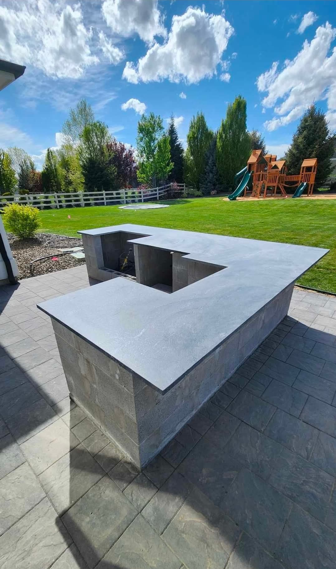 Outdoor U-shaped stone counter
